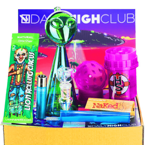 Daily High Club subscription box with alien glass bong, hemp wraps, pink grinder, and rolling supplies