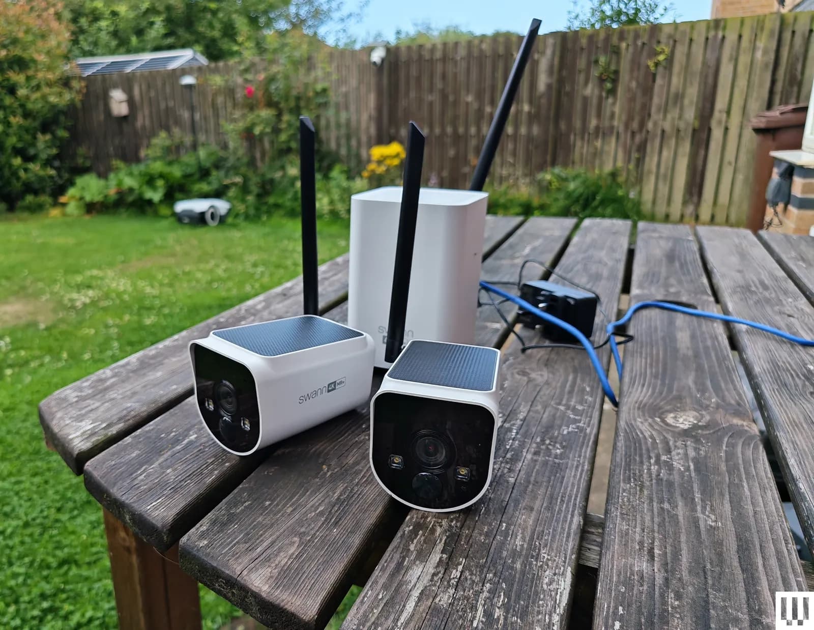 Outdoor security camera mounted for driveway and porch coverage