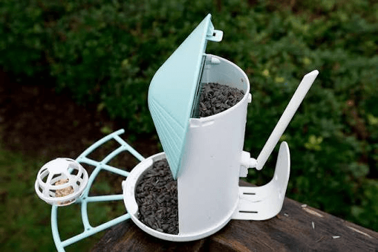 Birdfy Feeder with the roof open for easy seed refill