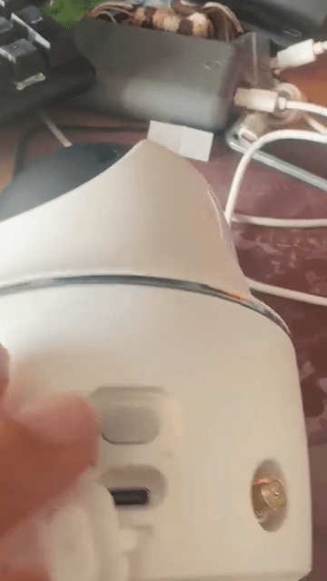 Argus PT Ultra weather seal opened to show microSD slot and USB-C charging port